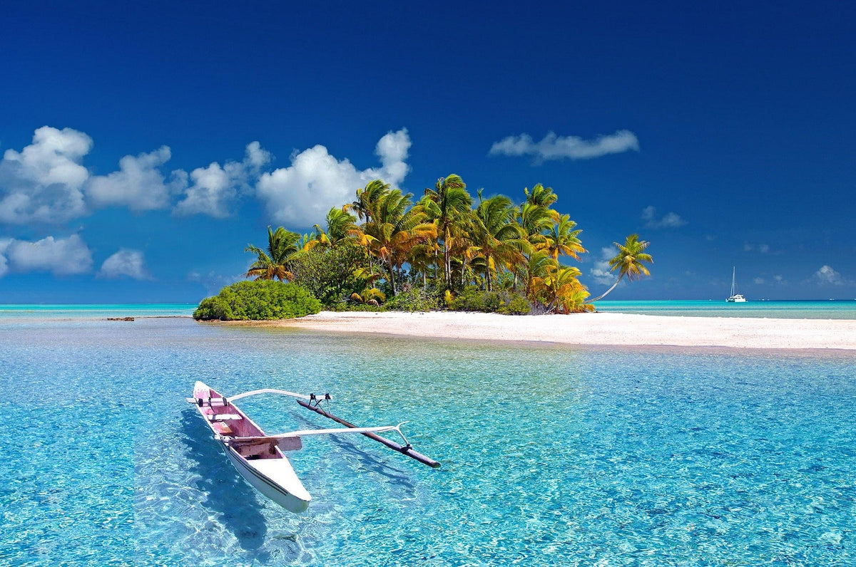 Aerial view of one of the world’s most stunning hidden beaches with turquoise water, white sand, and dramatic surrounding cliffs